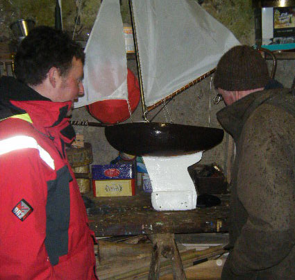 Loughie checks the repositioned lead ballast on Douglas's keel. Photo: SR